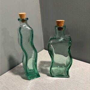 Set of Two Green Glass Wavy Bottles